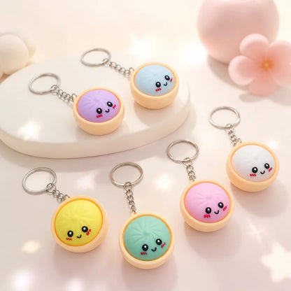 🔥 Uroczy breloczek-zabawka antystresowa w kształcie pierożka – podświetlany (reaguje na dotyk)