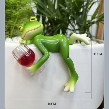 Miniaturowe figurki żab, dekoracje roślinne