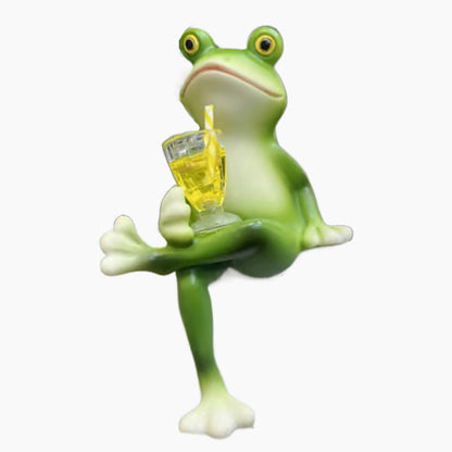 Miniaturowe figurki żab, dekoracje roślinne