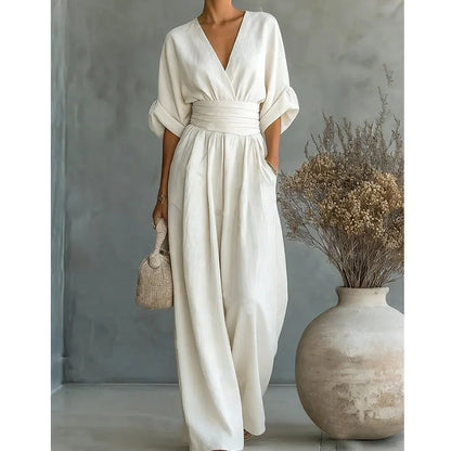 👗 TERAZ 50% ZNIŻKI! ✨ Elegancki kombinezon z dekoltem w serek i szerokimi nogawkami – podkreślająca sylwetkę wiązana w pasie, miękka, oddychająca tkanina i luźny krój 🦋