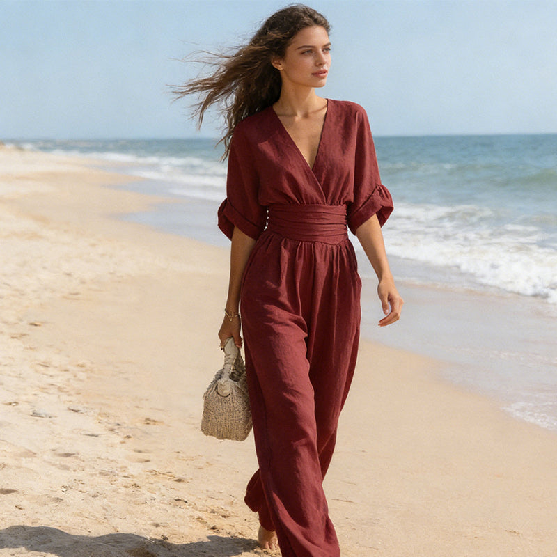 👗 TERAZ 50% ZNIŻKI! ✨ Elegancki kombinezon z dekoltem w serek i szerokimi nogawkami – podkreślająca sylwetkę wiązana w pasie, miękka, oddychająca tkanina i luźny krój 🦋