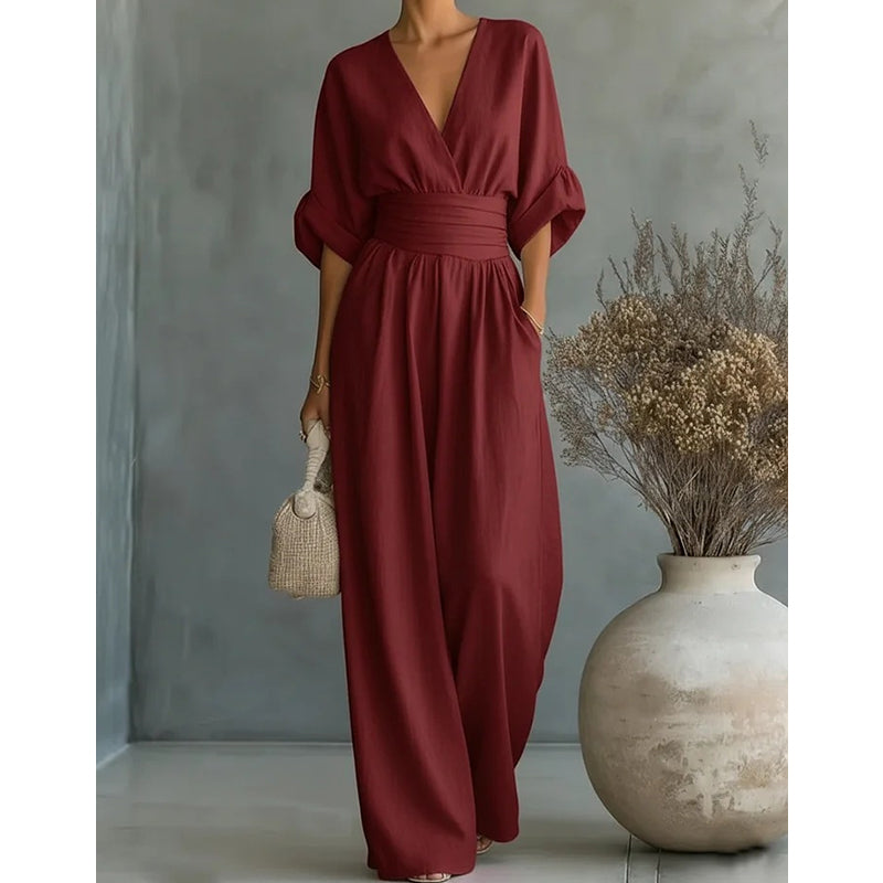 👗 TERAZ 50% ZNIŻKI! ✨ Elegancki kombinezon z dekoltem w serek i szerokimi nogawkami – podkreślająca sylwetkę wiązana w pasie, miękka, oddychająca tkanina i luźny krój 🦋