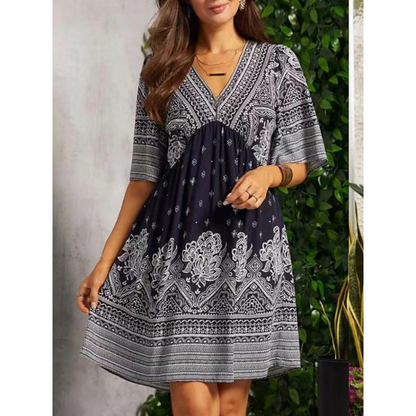 🌿☀️ TYLKO TERAZ –50%! 🌸 Damska sukienka boho w kwiaty z dekoltem w serek – wyraziste kwiatowe wzory i zwiewne rękawy